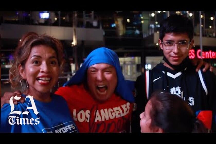 Fans outside Staples Center celebrate the Clippers curse-breaking victory