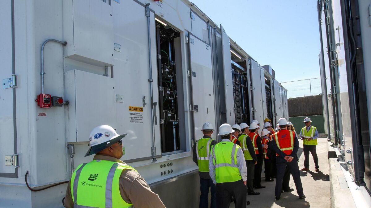 SDG&E gives a tour of a lithium-ion battery enclosure at the world's largest lithium-ion battery energy storage facility in Escondido on Feb. 24, 2017.