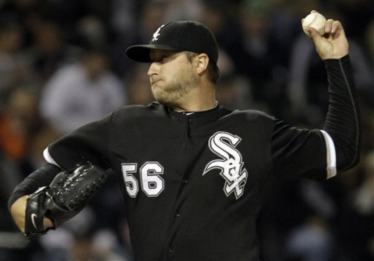 Buehrle, Thome lead Sox past Twins