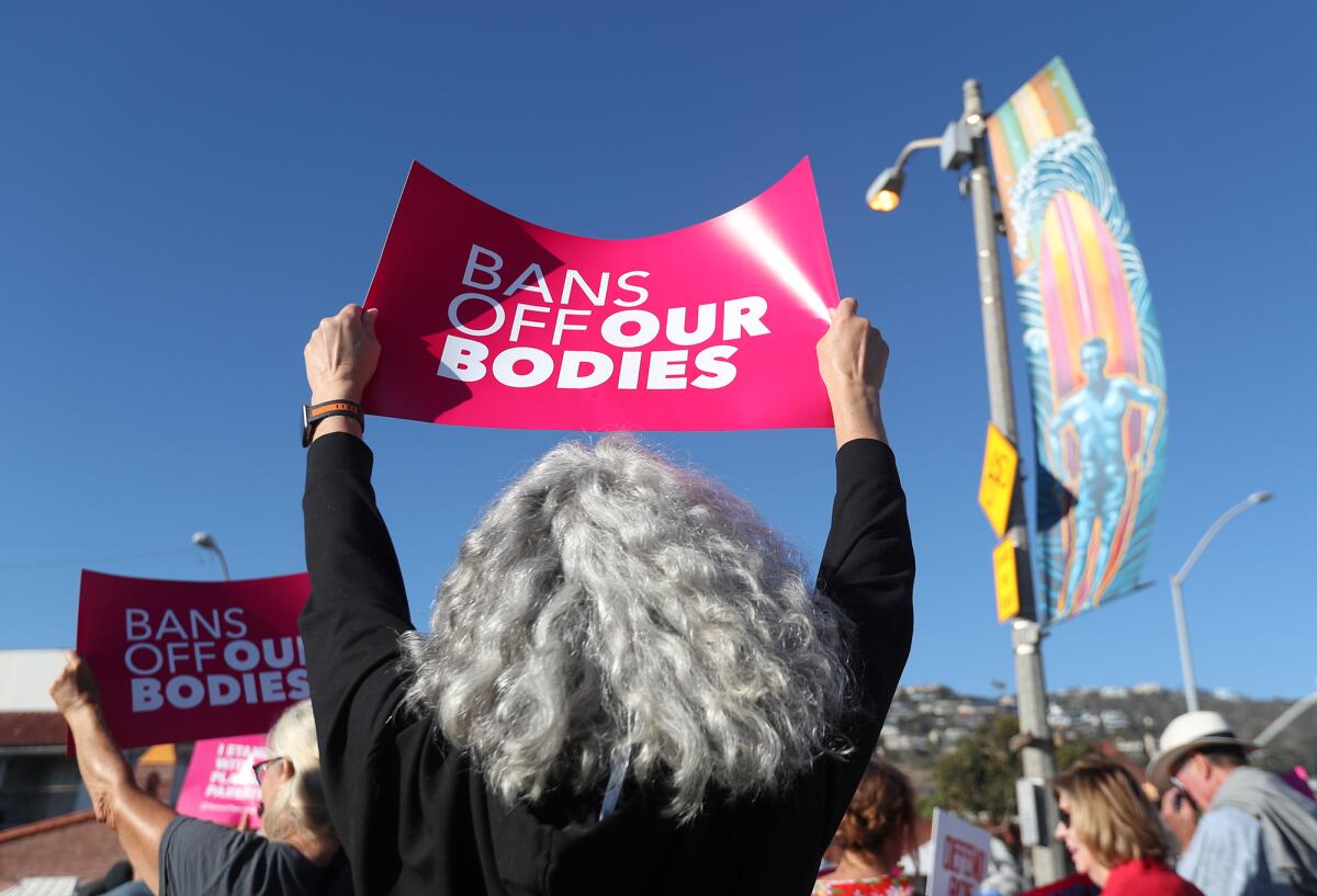 Protesters demonstrate against the decision by the Supreme Court to overturn the Roe vs. Wade ruling on Friday.