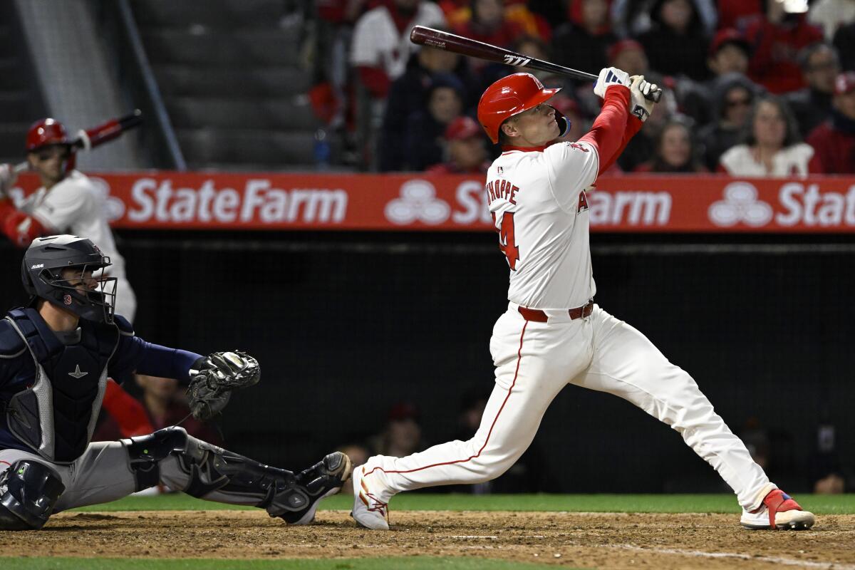 Angels catcher Logan O'Hoppe follows through on a grand slam home run during the sixth inning.