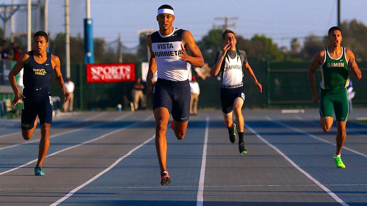 Vista Murrieta's Michael Norman blazes to victory in the 400-meter dash in 46.21 seconds at the Southern Section Masters Meet on Friday.