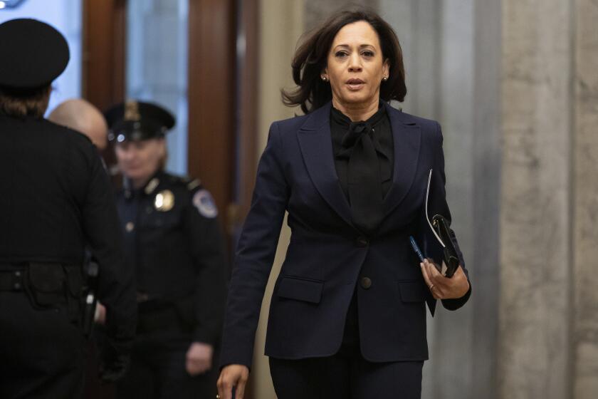 Sen. Kamala Harris, D-Calif., arrives on Capitol Hill in Washington, Friday, Jan. 31, 2020, for the impeachment trial of President Donald Trump on charges of abuse of power and obstruction of Congress. (AP Photo/ Jacquelyn Martin)