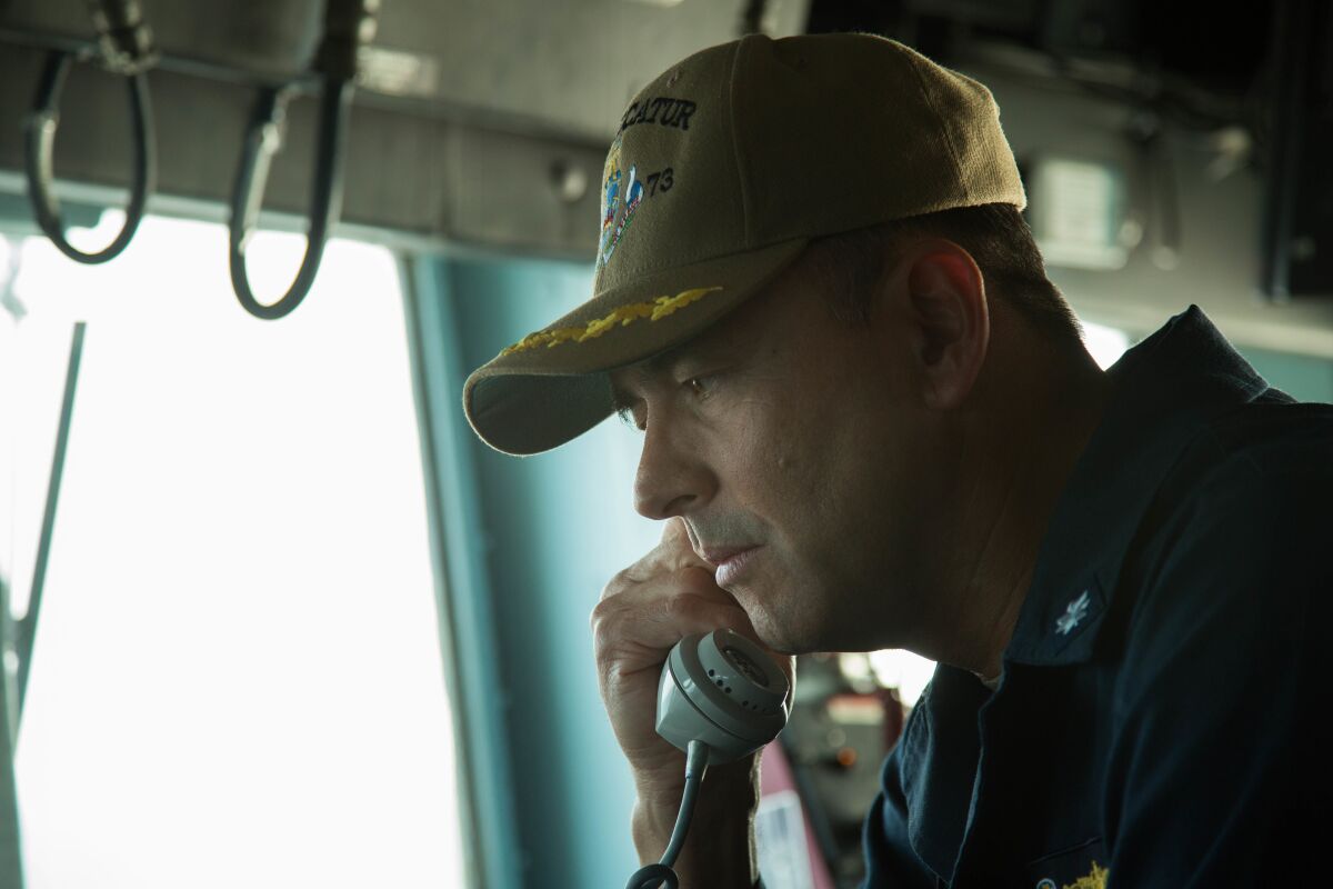 ARABIAN GULF (Jan. 9, 2019) Cmdr. John "Bob" Bowen, commanding officer of the Arleigh Burke-class guided-missile destroyer USS Decatur (DDG 73), speaks to a crewmember during a January 2019 exercise. He was relieved of command Jan. 16, 2020.