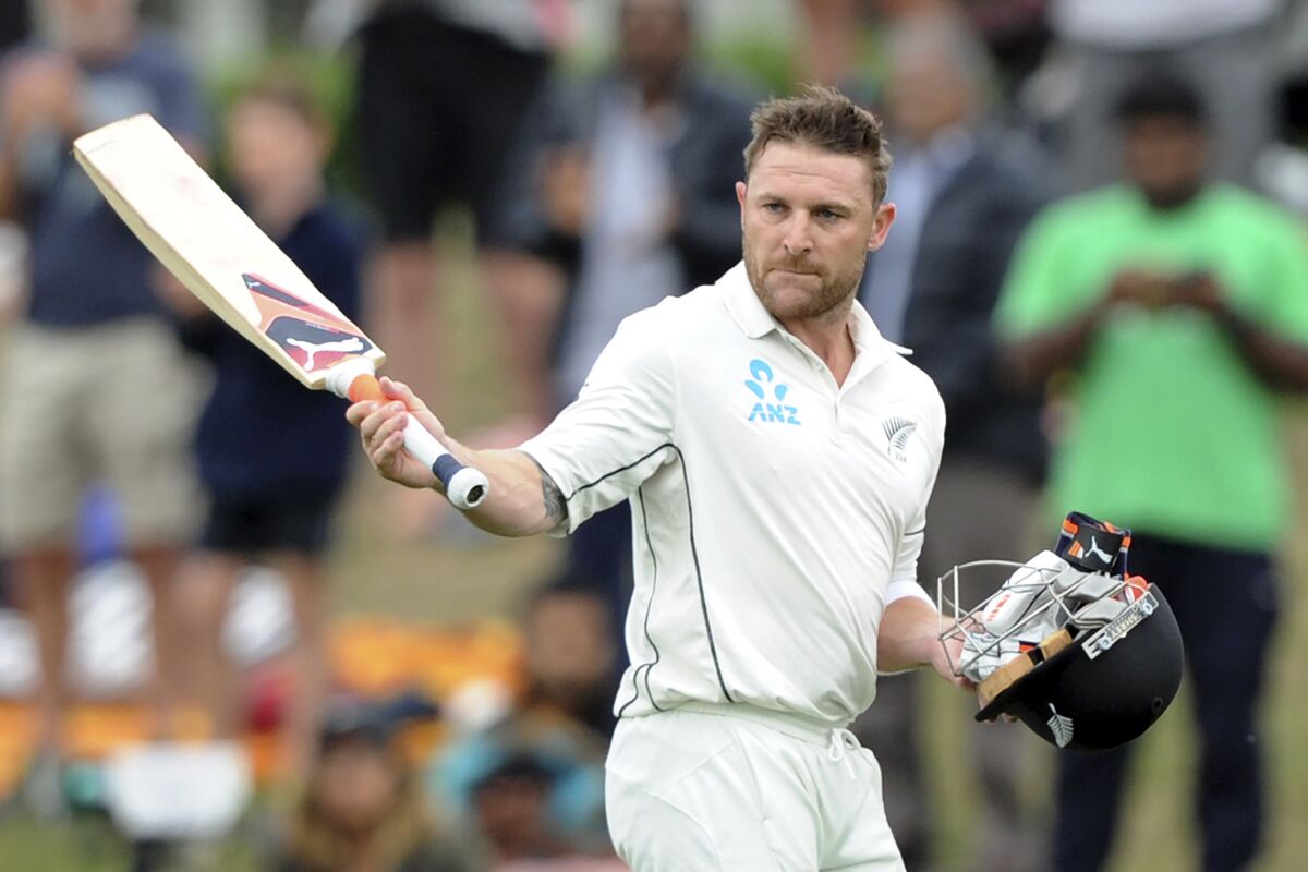 FILE - New Zealand's Brendon McCullum salutes the crowd as he leaves the field for the last time for his team after being dismissed for 25 by Australia's Josh Hazelwood on the third day of the second international cricket test match at Hagley Park Oval in Christchurch, New Zealand, Monday, Feb. 22, 2016. McCullum has been hired as head coach of England’s test team in another bold appointment coming soon after the decision to select Ben Stokes as captain. (Ross Setford/SNPA via AP)