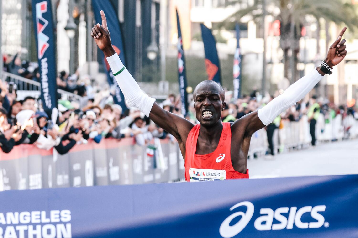 Dominic Ngeno, Stacy Ndiwa celebrate after winning 2024 L.A. Marathon