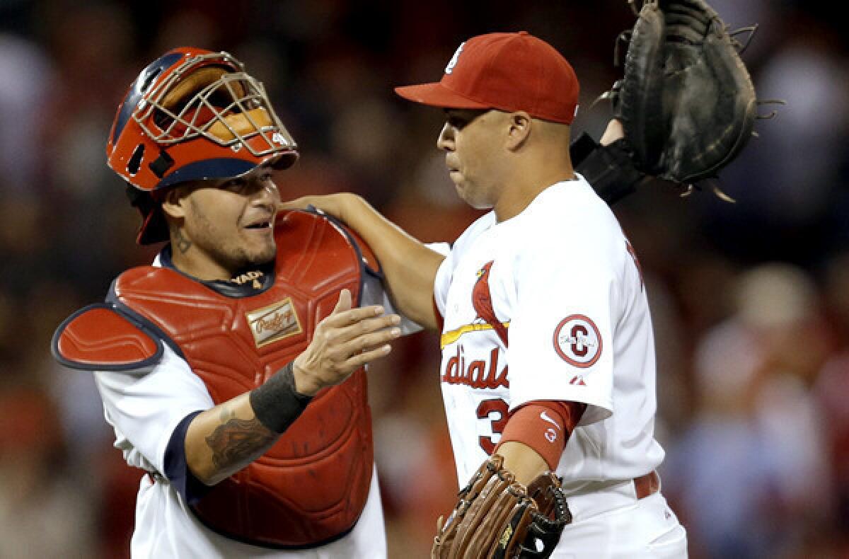 Catcher Yadier Molina and slugger Carlos Beltran help make the Cardinals a tough team to beat in the playoffs.