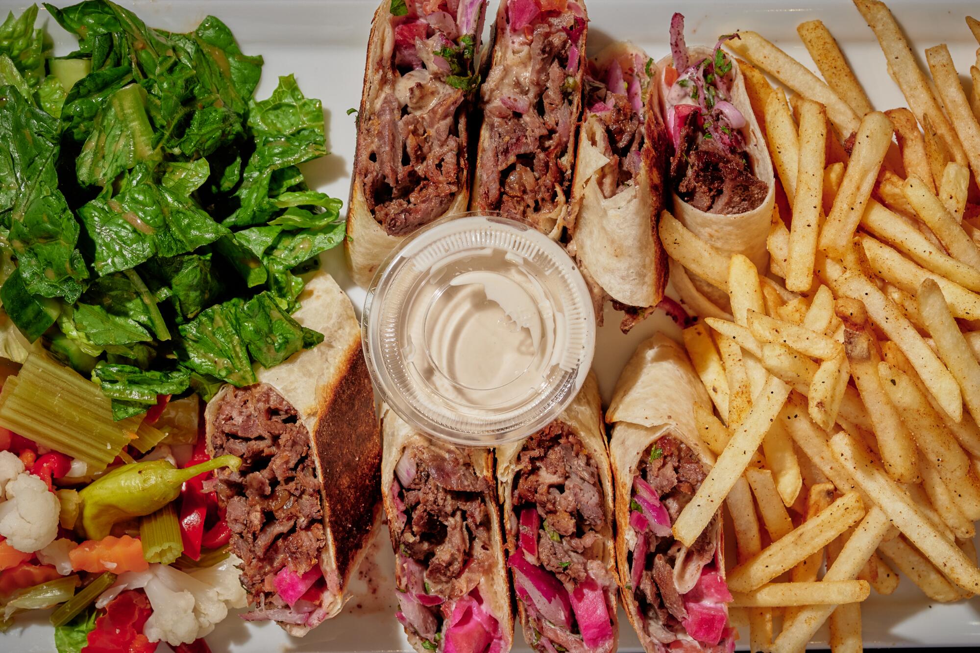 A Beef Mama's plate, starring a beef shawarma wrap, at Mama's Shawarma.