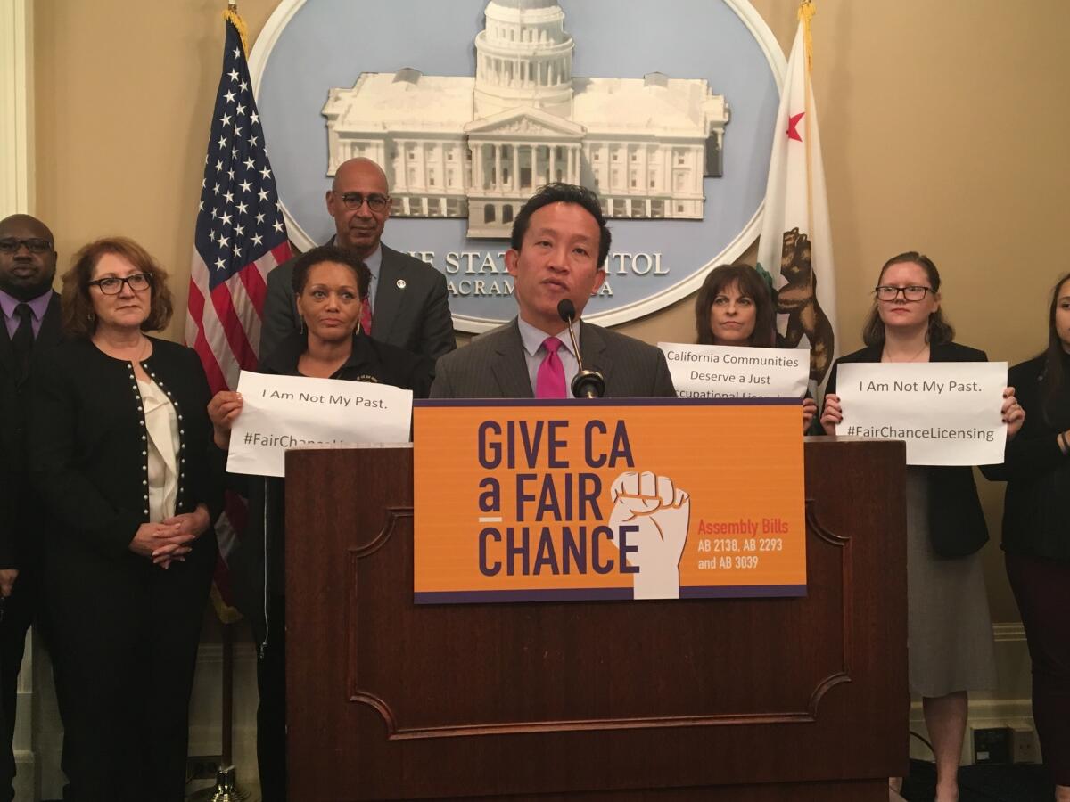 Assemblyman David Chiu (D-San Francisco) along with supporters of bills to allow more former felons to receive professional licenses.