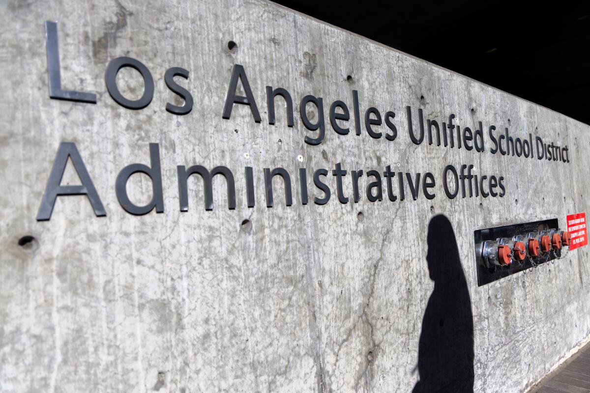 A silhouette on a sign for the Los Angeles Unified School District Administrative Offices.