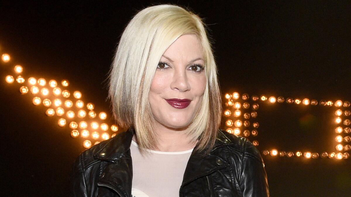 Tori Spelling burned her arm badly in an accident at a Benihana restaurant on Easter Sunday.
