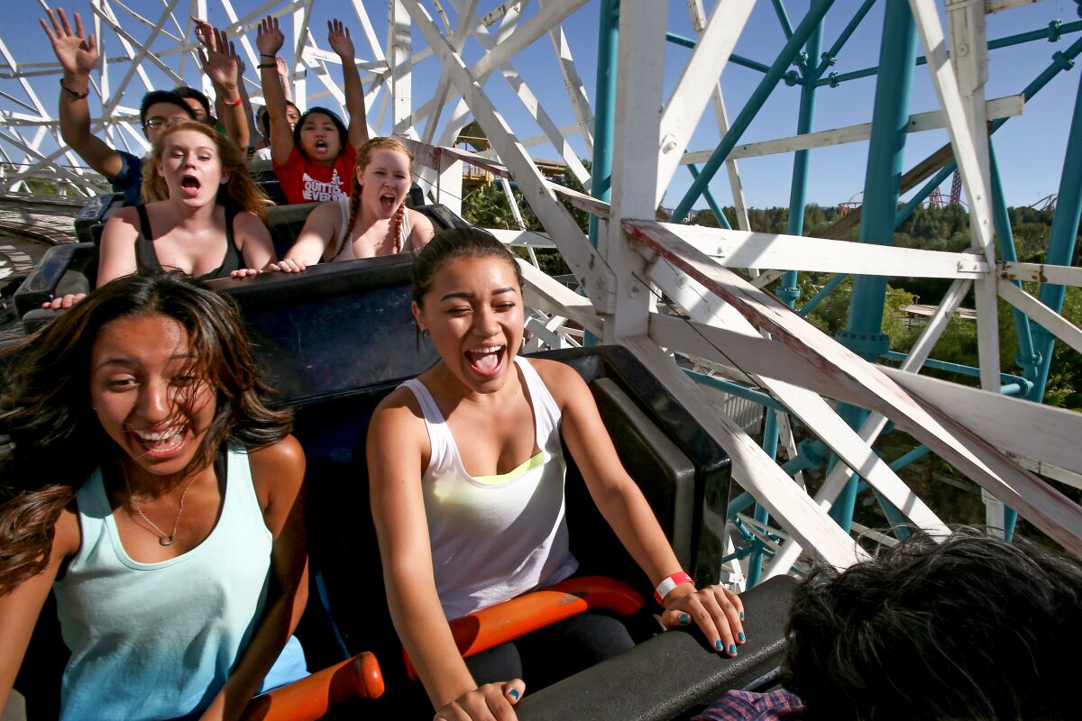 Riders on a roller coaster at Six Flags Magic Mountain.