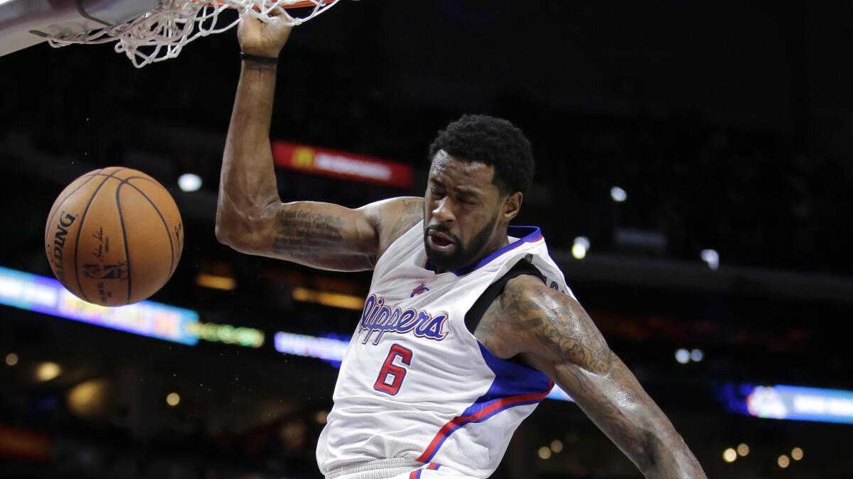 Clippers center DeAndre Jordan dunks during the first half of a game against the Phoenix Suns on Dec. 8.