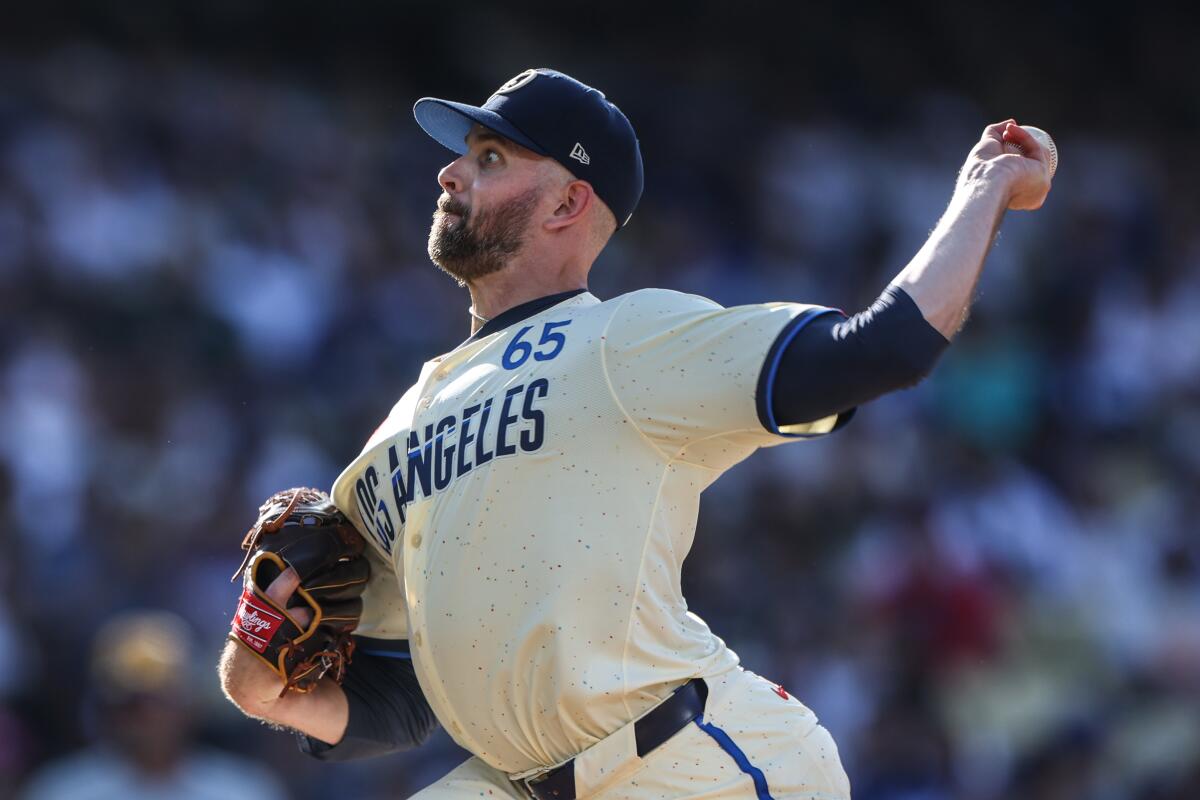 Dodgers starting pitcher James Paxton delivers during a 5-3 win over the Milwaukee Brewers at Dodger Stadium.