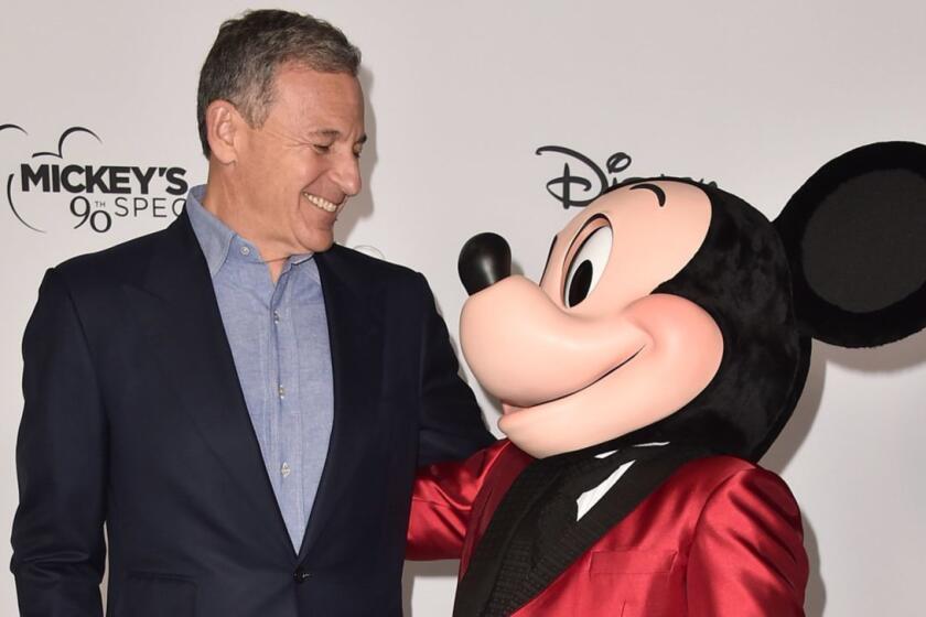 LOS ANGELES, CA - OCTOBER 06: Bob Iger and Mickey Mouse attend Mickey's 90th Spectacular at The Shrine Auditorium on October 6, 2018 in Los Angeles, California. (Photo by Alberto E. Rodriguez/Getty Images) ** OUTS - ELSENT, FPG, CM - OUTS * NM, PH, VA if sourced by CT, LA or MoD **