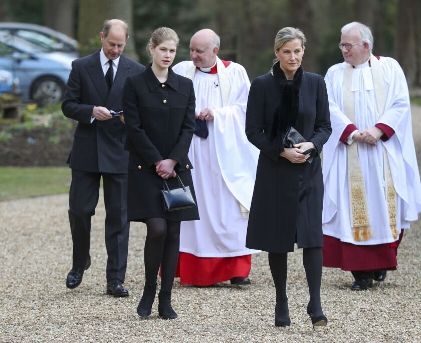 Britain's Prince Edward, Sophie Countess of Wessex and their daughter Lady Louise Windsor, attend the Sunday service at the Royal Chapel of All Saints at Royal Lodge, Windsor, following the announcement of Prince Philip, in England, Sunday, April 11, 2021. Britain's Prince Philip, the irascible and tough-minded husband of Queen Elizabeth II who spent more than seven decades supporting his wife in a role that mostly defined his life, died on Friday. (Steve Parsons/Pool Photo via AP)