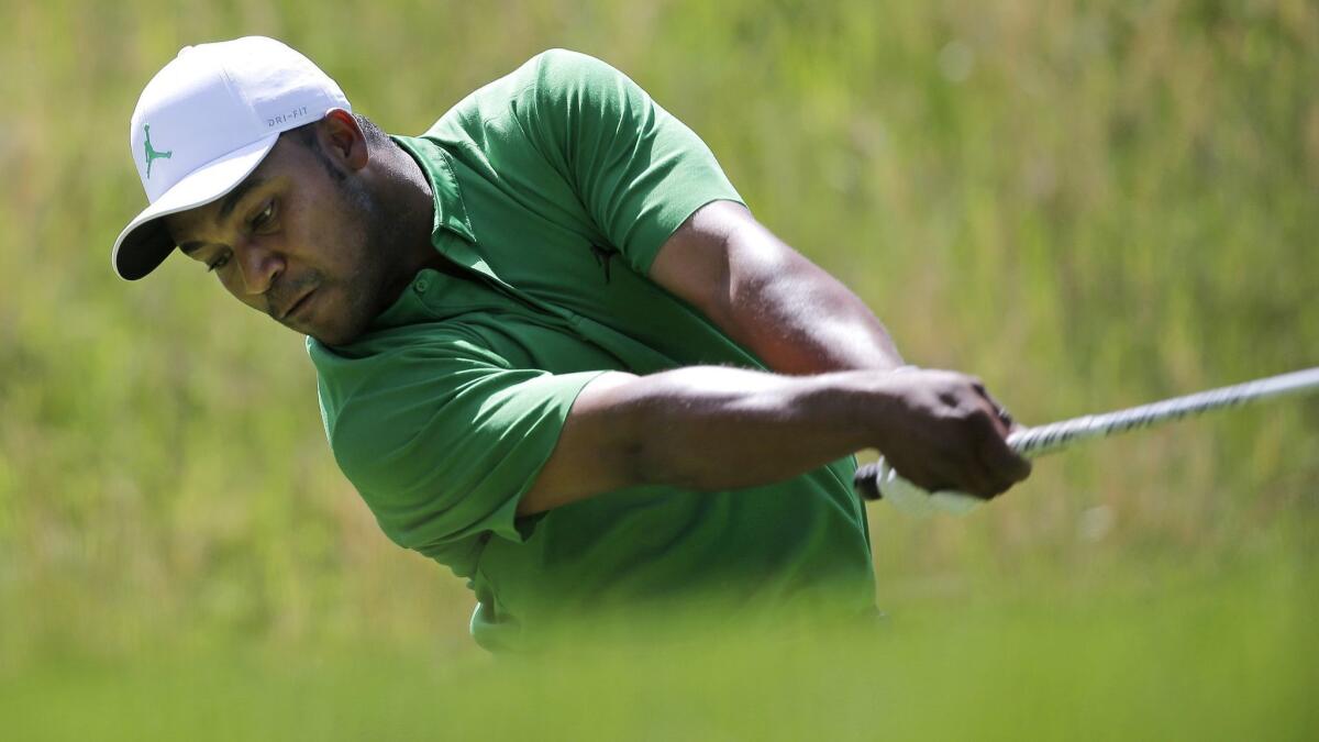Harold Varner III drives off the fourth tee during the third round of the PGA Championship on May 18.