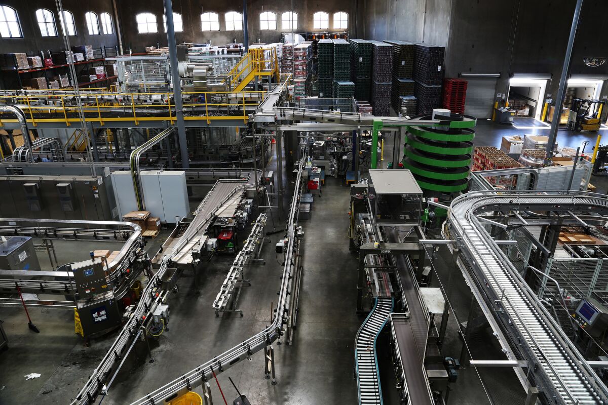 Trails of conveyor belts line a production room at Stone Brewery in Escondido.