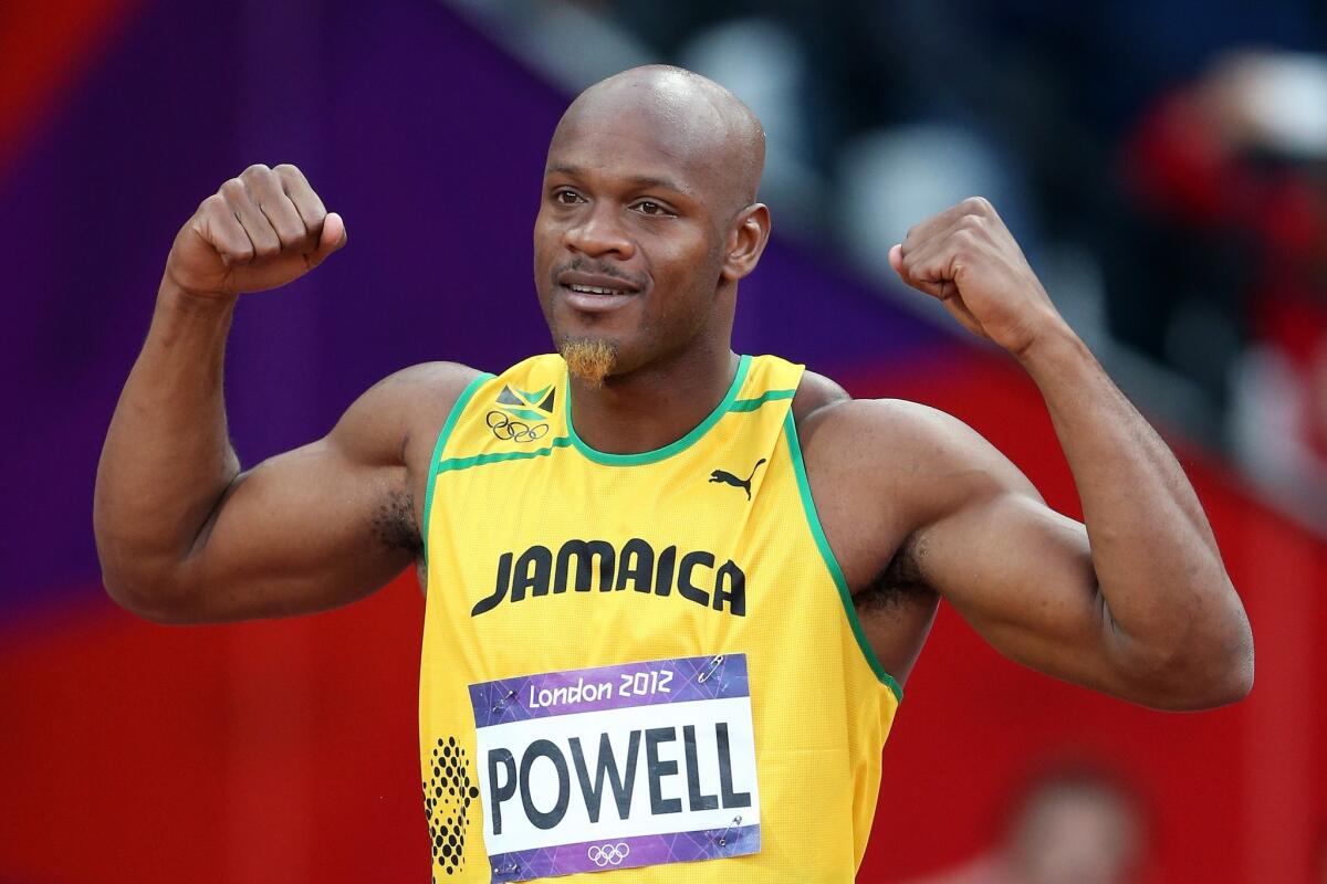 Former world 100-meter record holder Asafa Powell received an 18-month suspension for a positive doping test.