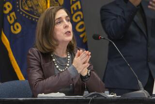 Oregon Gov. Kate Brown speaks Tuesday, Nov. 10, 2020, in Portland, Ore. Brown and Oregon health officials warned Tuesday of the capacity challenges facing hospitals as COVID-19 case counts continue to spike in the state. (Cathy Cheney/Pool Photo via AP)