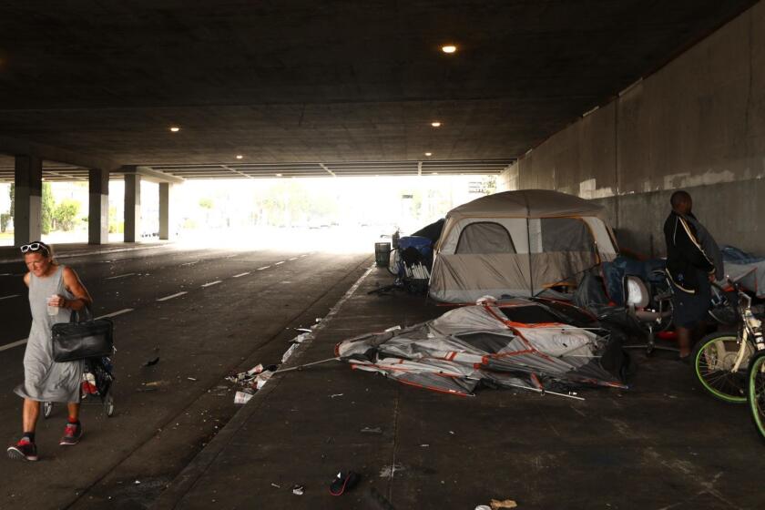 LOS ANGELES, CA - JUNE 4, 2019 - - Around 25 homeless people reside in a camp underneath the 405 freeway on Venice Blvd. in Los Angeles on June 4, 2019. The homeless refer to the area, between Tuller and Globe Avenues, as Westside Skidrow." People in the encampment range in age from early 20s to the early 60s. Homelessness jumps 12% in L.A. County, 16% in the city, leaving officials 'stunned.' In a setback for multi-million dollar efforts to reduce homelessness, the number of people on the streets and in shelters was up in double digits in 2019. (Genaro Molina/Los Angeles Times)