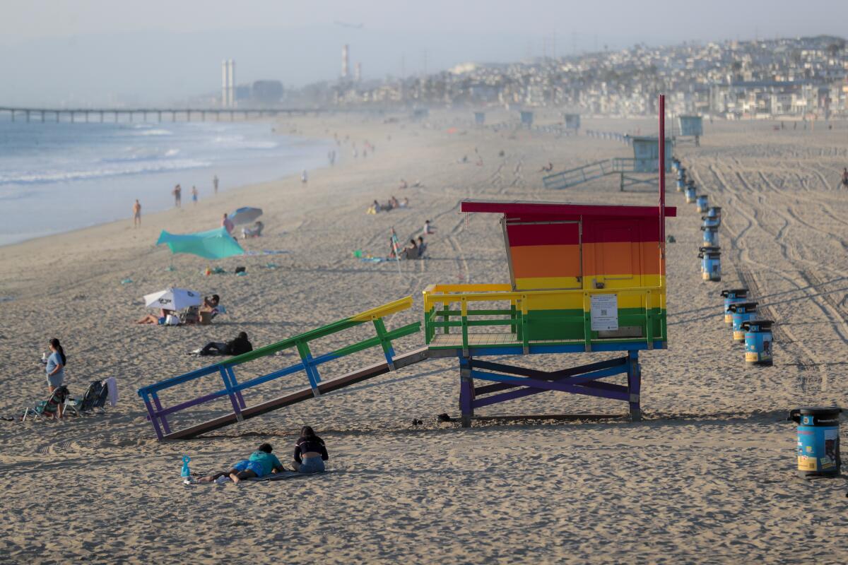 A Hermosa Beach lifeguard tower is seen painted in LGBTQ+ Pride colors in 2021. 