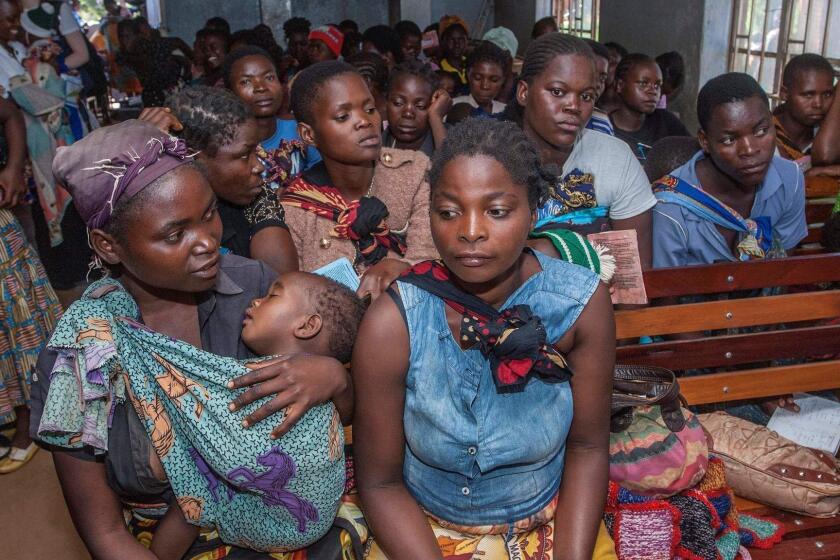 Mothers wait for their sick babies to receive treatment at the beginning of the Malaria vaccine implementation pilot programme at Mitundu Community hospital in Malawi's capital district of Lilongwe, on April 23, 2019. (Photo by AMOS GUMULIRA / AFP)AMOS GUMULIRA/AFP/Getty Images ** OUTS - ELSENT, FPG, CM - OUTS * NM, PH, VA if sourced by CT, LA or MoD **