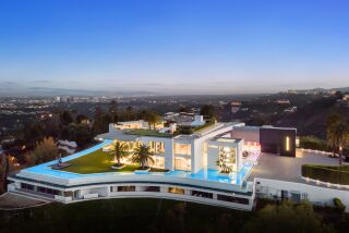 An auction of the mega-mansion known as “The One” has been put on hold.