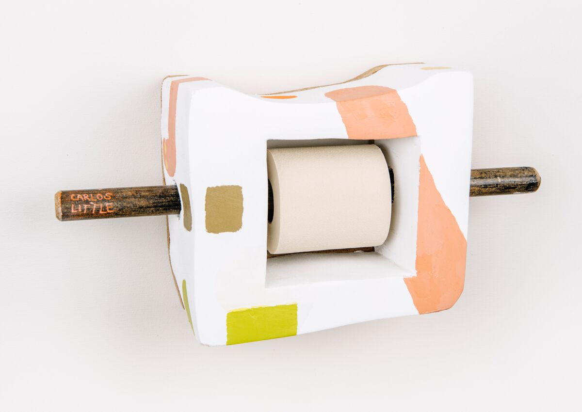 Carlos Little's toilet paper holder is meant to look like a chunk of wall.