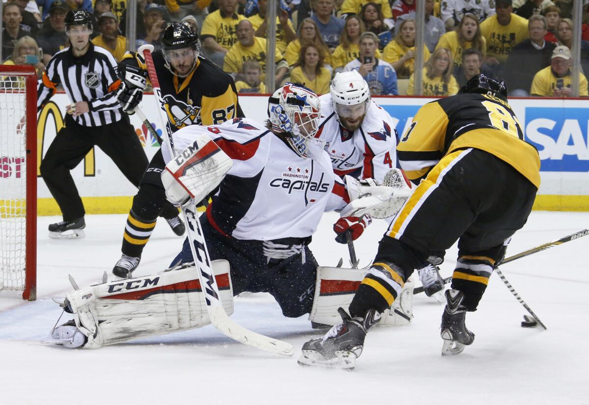 Penguins forward Phil Kessel, right, shoots and scores on Capitals goalie Braden Holtby during the second period of Game 6 of the Eastern Conference semifinals on May 10.