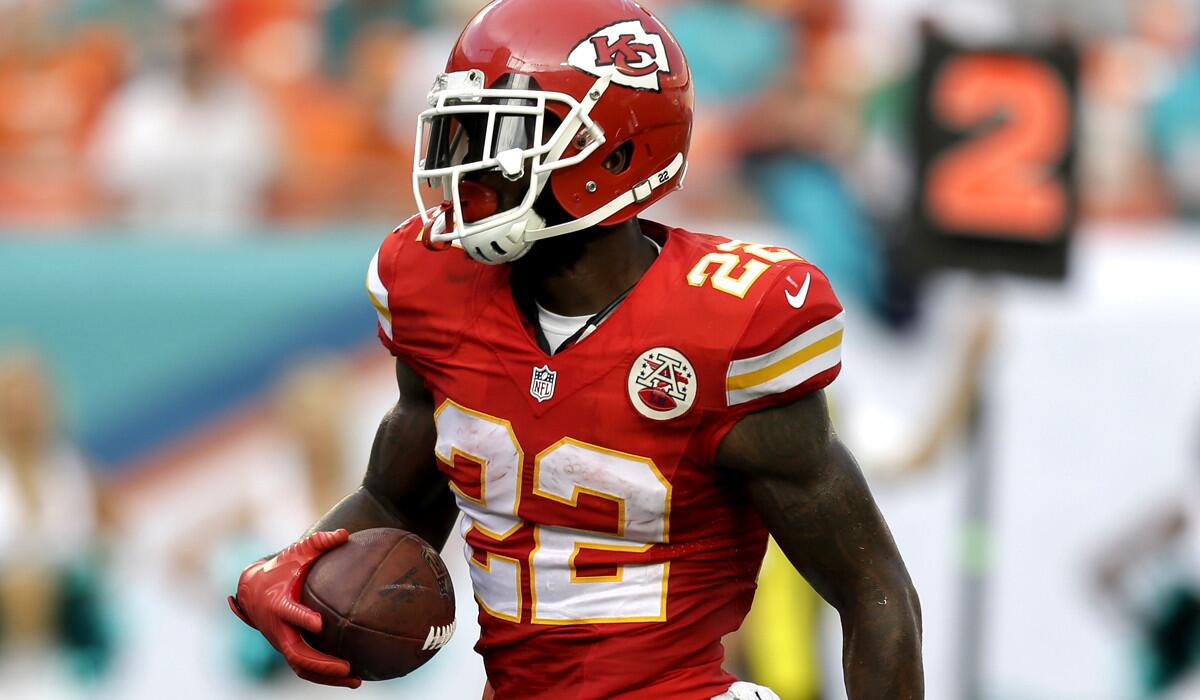Kansas City Chiefs running back Joe McKnight scores a touchdown against the Miami Dolphins in the second half last week.