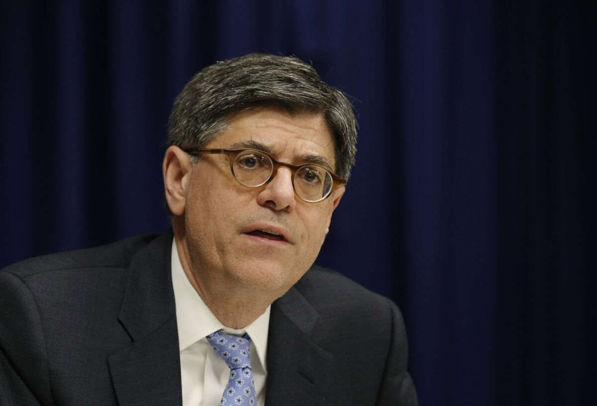 Treasury Secretary Jacob Lew, shown March 1, said the new rules are designed to make inversions less economically beneficial for companies.