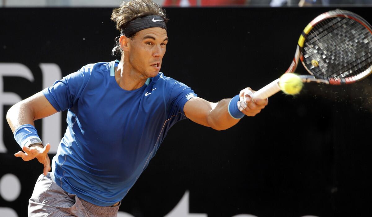 Rafael Nadal tracks down a shot in a victory over Mikhail Youzhny on Thursday at the Italian Open in Rome.