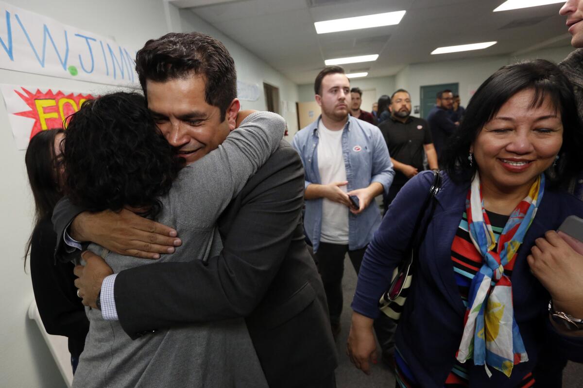 Assemblyman Jimmy Gomez, a candidate for the 34th Congressional District seat, hugs a supporter during the April 4 primary election night.
