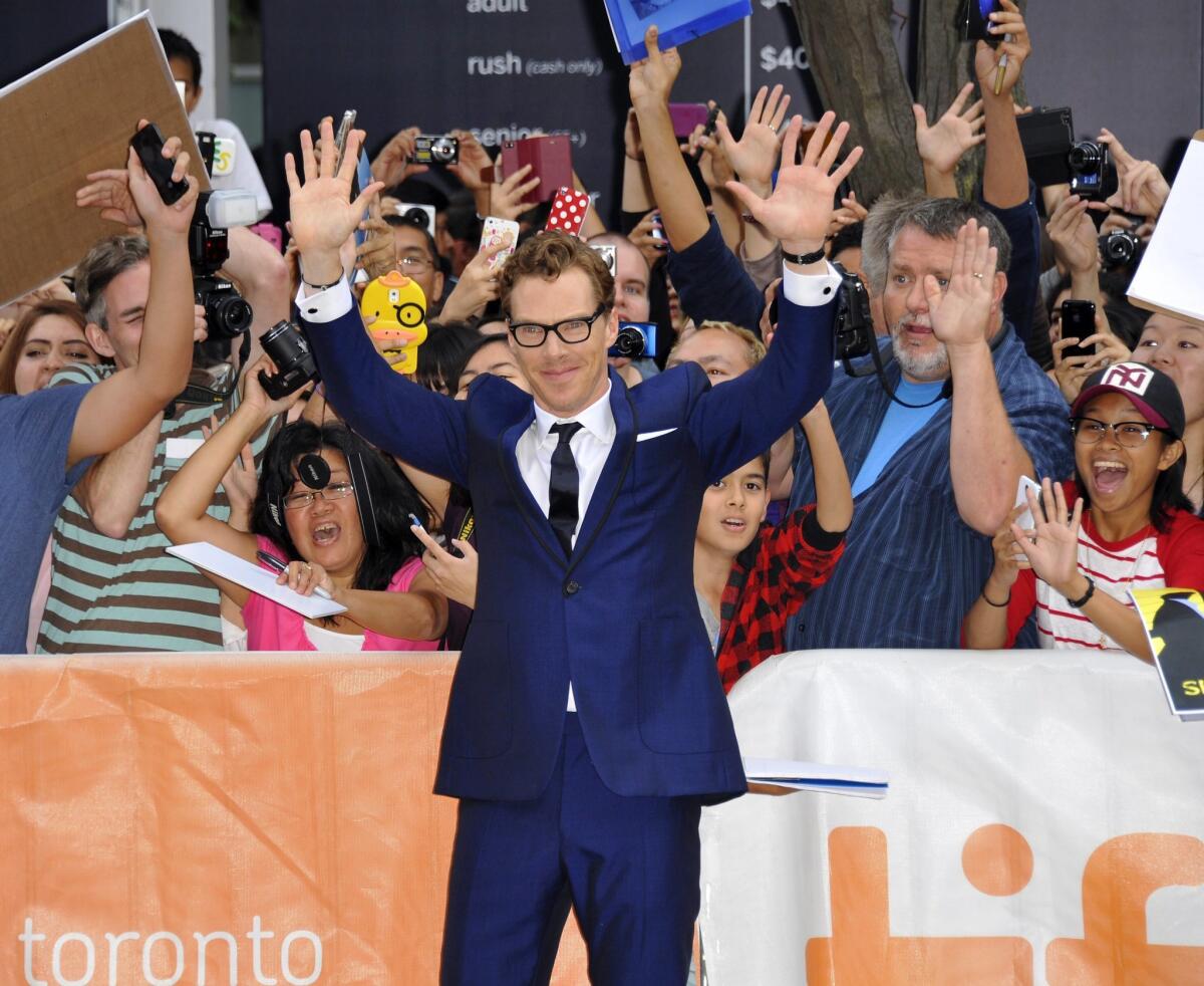 Benedict Cumberbatch greets the crowd at the Toronto premiere of "The Imitation Game."