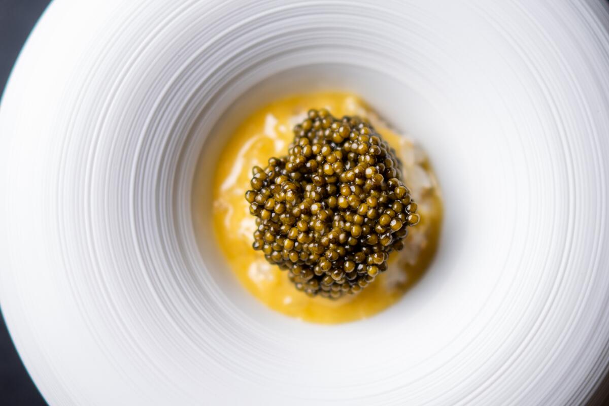 Caviar, smoked sabayon sauce and Koshihikari rice at Addison restaurant