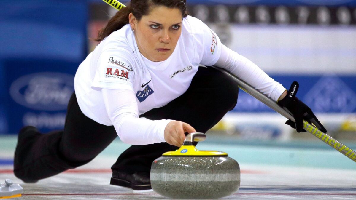 In this March 23, 2017, file photo, United States' Becca Hamilton releases the stone during a match against Switzerland in the Women's World Curling Championship in Beijing.
