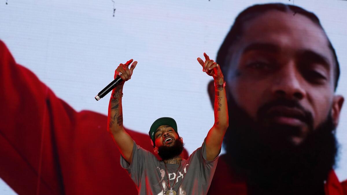 Rapper Nipsey Hussle, who was shot to death Sunday in South Los Angeles, performs during the Rolling Loud music festival at Exposition Park in L.A. on Dec. 14, 2018.