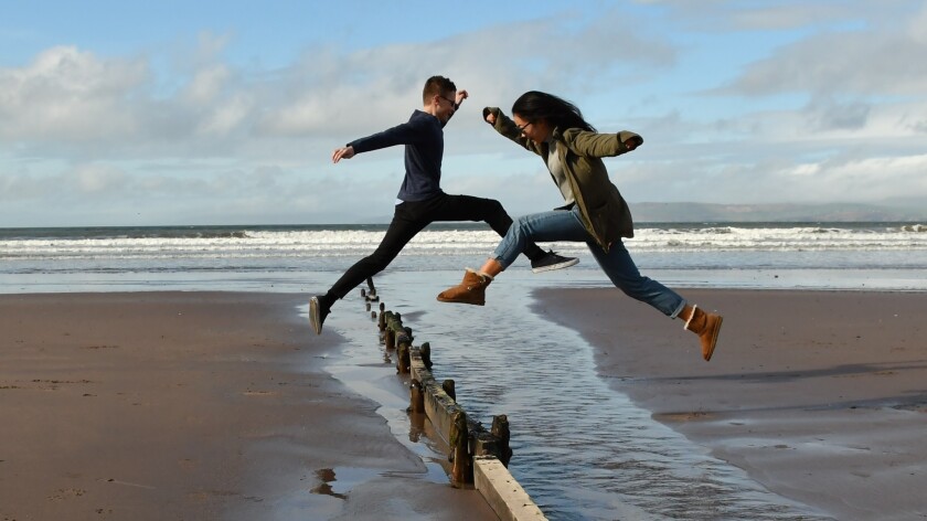 Jonathan and Grace take flight at Rossbeigh Beach, County Kerry.