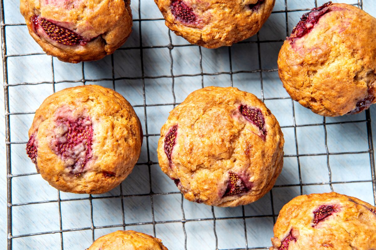 Strawberry Muffins on a rack, seen from above.