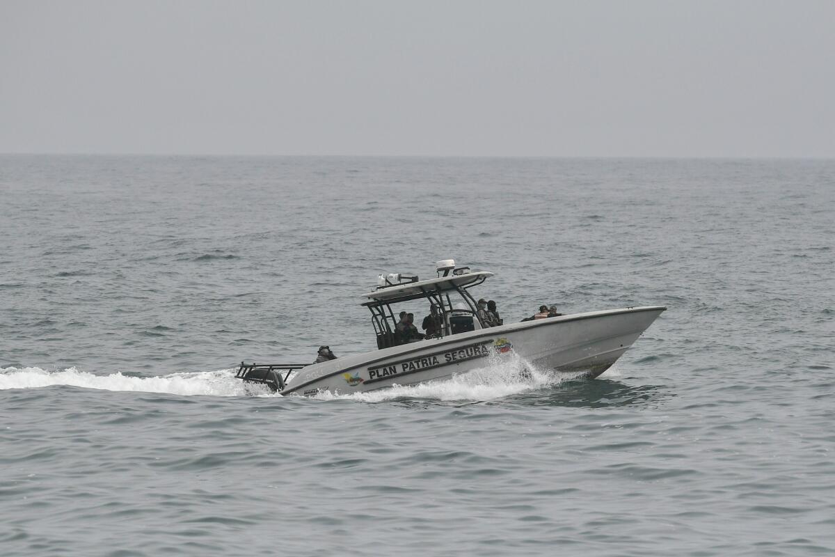 Security forces patrol by boat off La Guaira, Venezuela