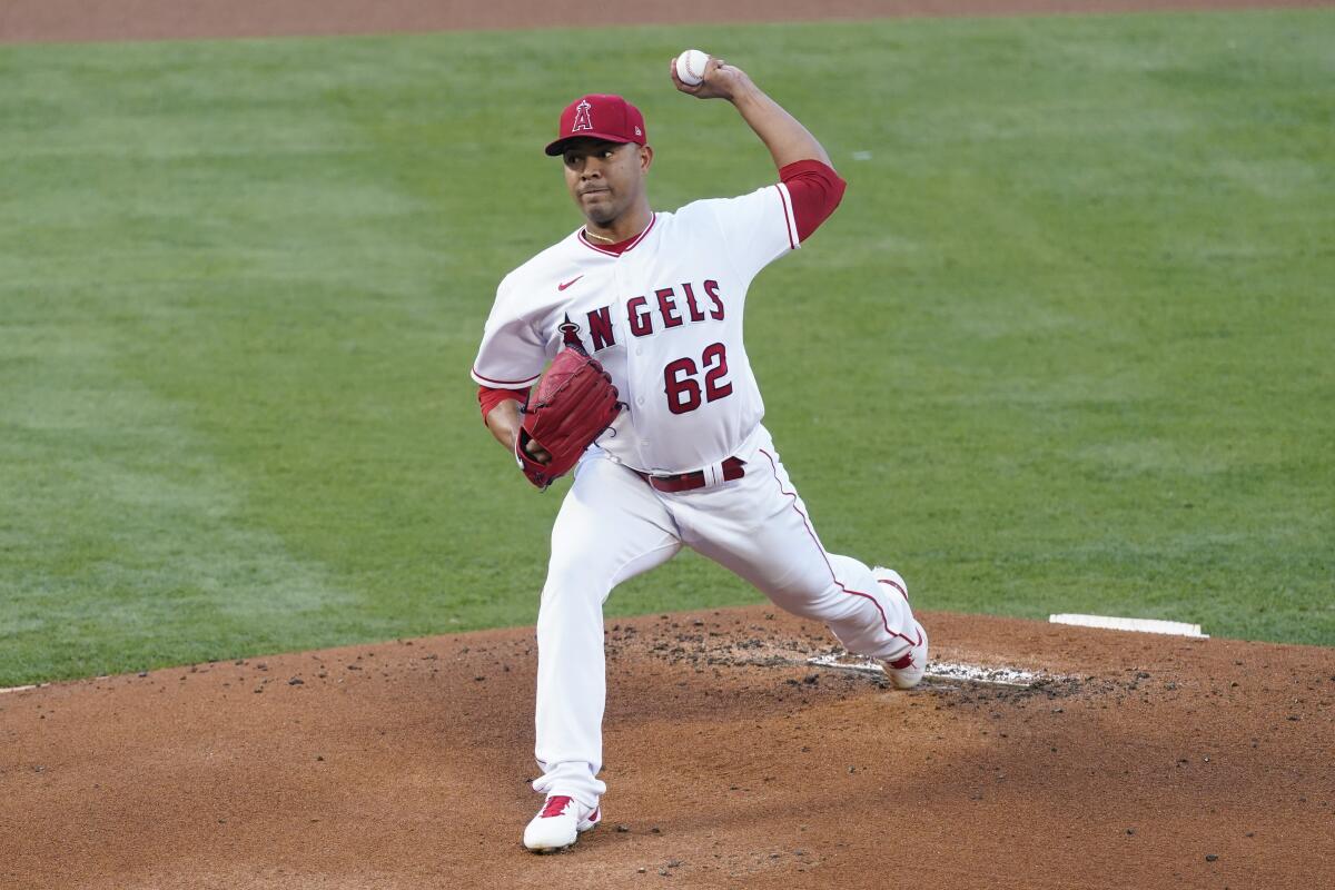 Angels starting pitcher Jose Quintana delivers during the first inning.