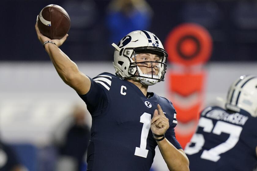 FILE - BYU quarterback Zach Wilson (1) throws down field in the first half during an NCAA college football game against Texas State in Provo, Utah, in this Saturday, Oct. 24, 2020, file photo. Wilson is a likely first round pick in the NFL Draft, April 29-May 1, 2021, in Cleveland. (AP Photo/Rick Bowmer, File)