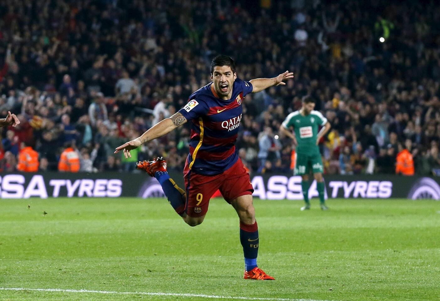 Barcelona's Luis Suarez celebrates his second goal against Eibar during their Spanish first division soccer match at Camp Nou stadium in Barcelona
