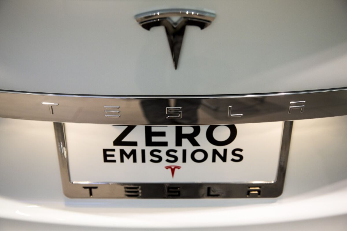 A detail of the rear end emblem of a Tesla Model S at the electric automaker's Santa Monica showroom.