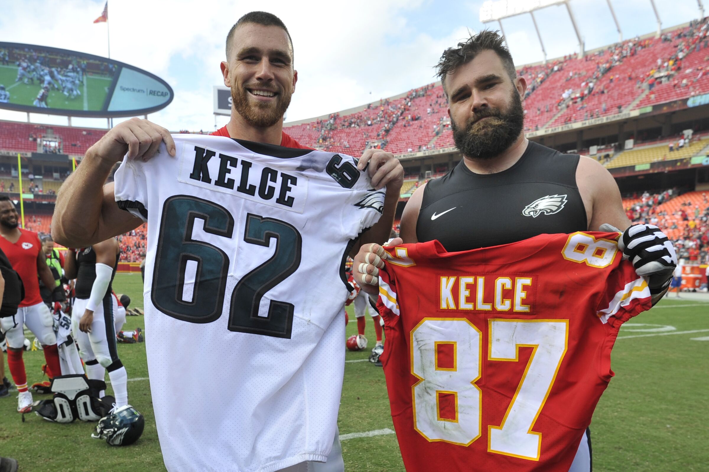 Chiefs tight end Travis Kelce, left, and his brother, Eagles center Jason Kelce, exchange jerseys.