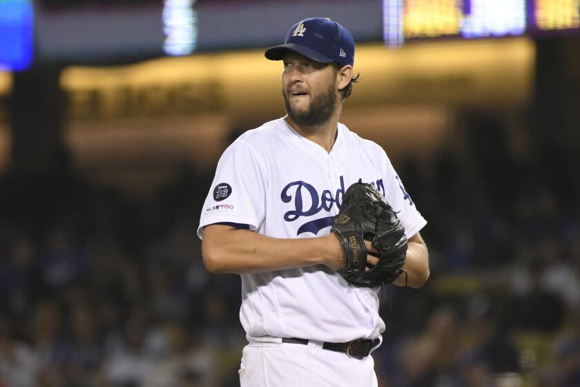 LOS ANGELES, CA - SEPTEMBER 20: Clayton Kershaw #22 of the Los Angeles Dodgers after giving up a home run to Garrett Hampson #1of the Colorado Rockies at Dodger Stadium on September 20, 2019 in Los Angeles, California. The Dodgers won 12-5. (Photo by John McCoy/Getty Images)