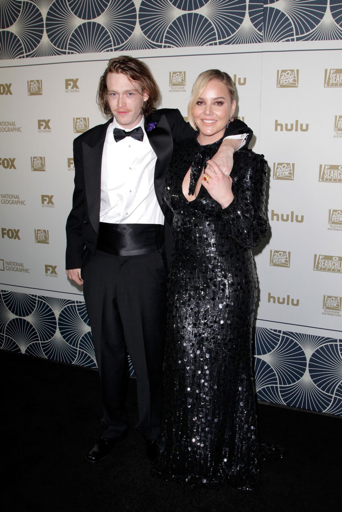 Actors Caleb Landry Jones, left, and Abbie Cornish at the 2018 FOX, FX and Hulu Golden Globes after party at the Beverly Hilton Hotel ()