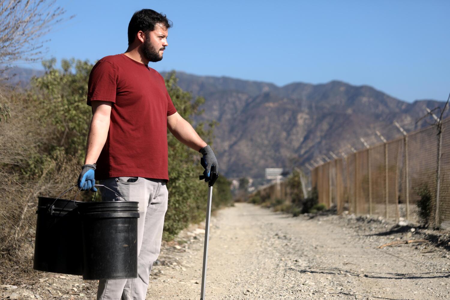 IRWINDALE, CA - OCTOBER 11, 2025 -- Meteorologist Edgar McGregor knows about the science behind Santa Ana winds and keeps a watchful eye out at the Santa Fe Dam Recreation Area in Irwindale on Saturday, October 11, 2026. McGregor helped warn his weather-advisory subscribers to get out of Altadena in early January as hurricane-force winds approached and saved many lives in the process. He still has that service up and running while also working as a meteorologist now for L.A. County. (Genaro Molina/Los Angeles Times)