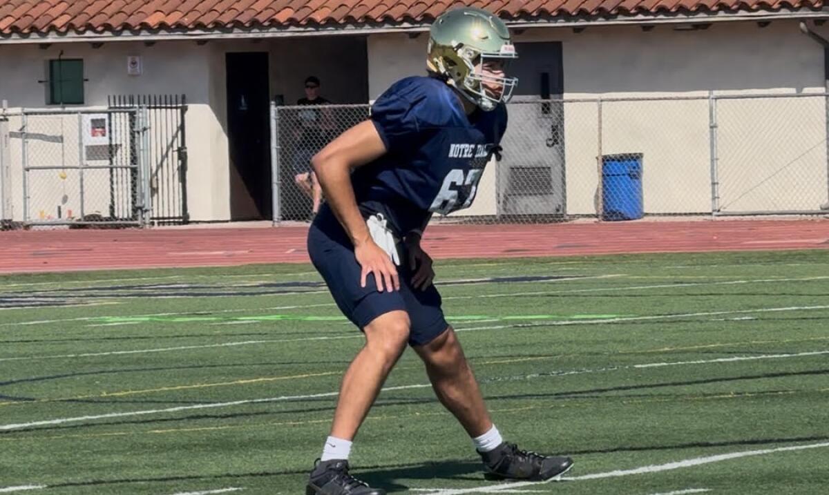 Basketball standout Tyran Stokes of Sherman Oaks Notre Dame made his first appearance in a football uniform on Monday.